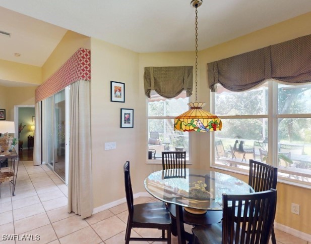 dining room featuring light tile patterned floors