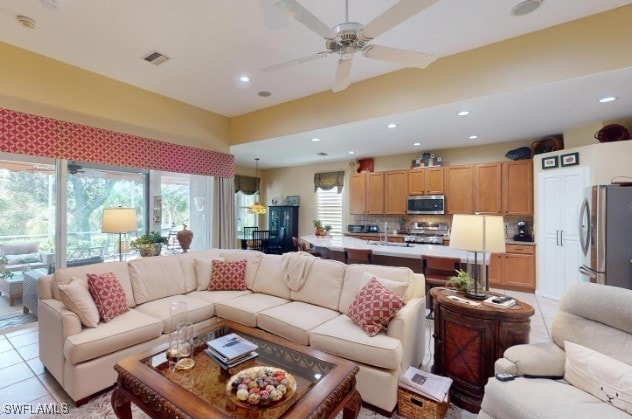 5291 Laurel Oak Ct, North Port, FL 34287 - living area featuring light tile patterned floors, ceiling fan, recessed lighting, and visible vents