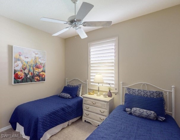 5291 Laurel Oak Ct, North Port, FL 34287 - carpeted bedroom featuring a ceiling fan