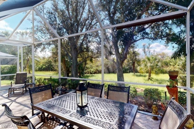 5291 Laurel Oak Ct, North Port, FL 34287 - sunroom with outdoor dining area