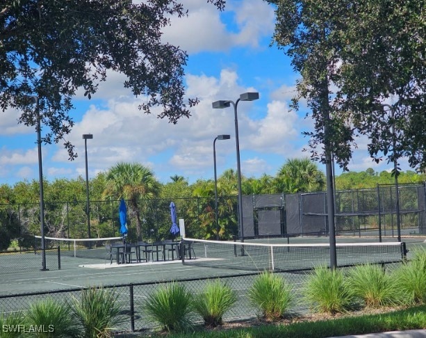 5291 Laurel Oak Ct, North Port, FL 34287 - view of sport court with fence