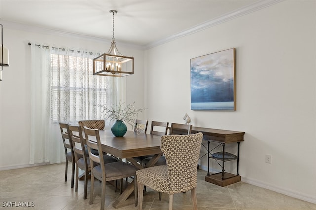 dining room featuring light tile patterned flooring, ornamental molding, and a chandelier