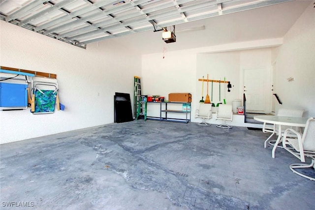 15801 Prentiss Pointe Cir Unit 102, Fort Myers, FL 33908 - garage featuring a garage door opener
