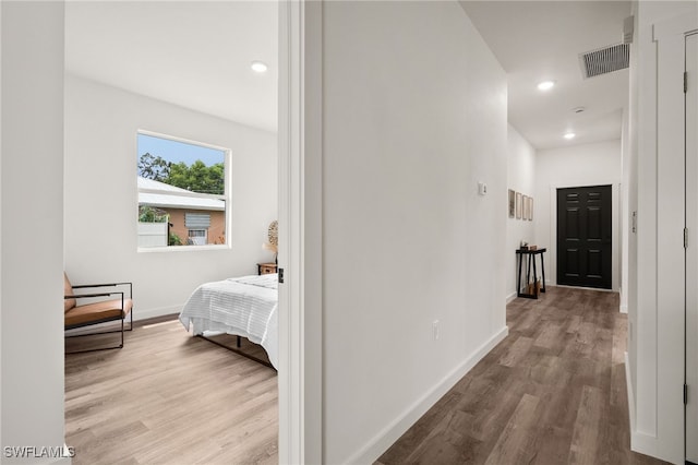 hallway featuring light hardwood / wood-style floors