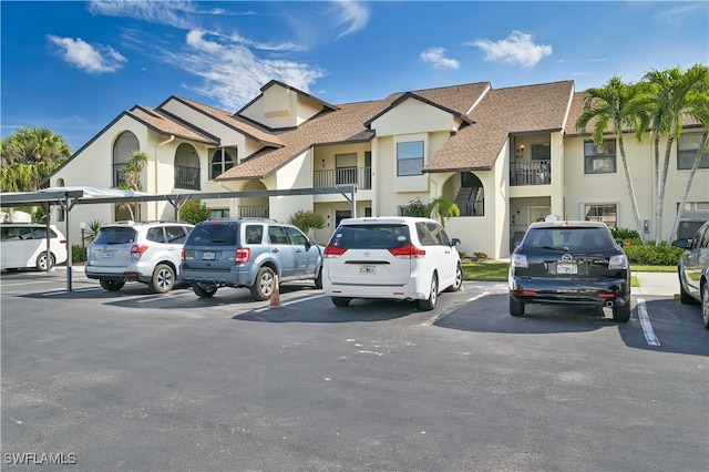 view of front of home with a balcony