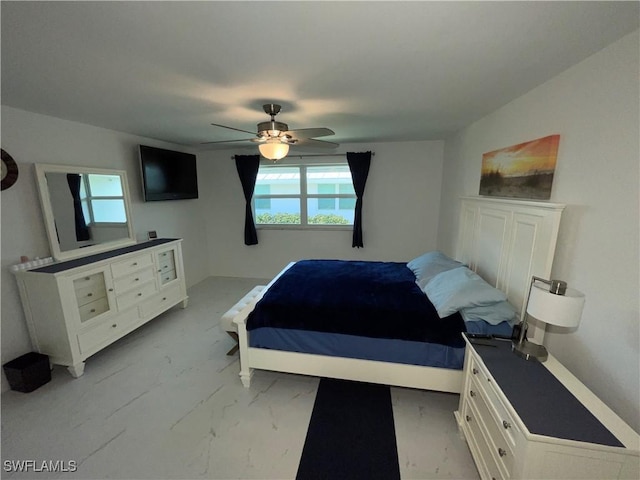 bedroom featuring ceiling fan