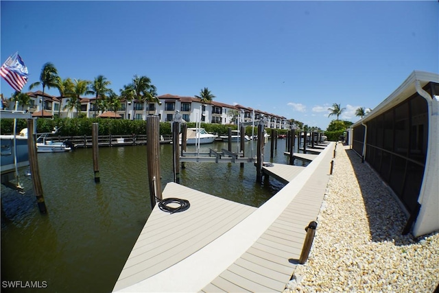 1425 Curlew Ave Unit 2-1, Naples, FL 34102 - dock area featuring a water view