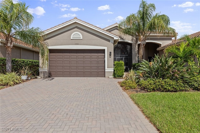 view of front of property featuring a garage