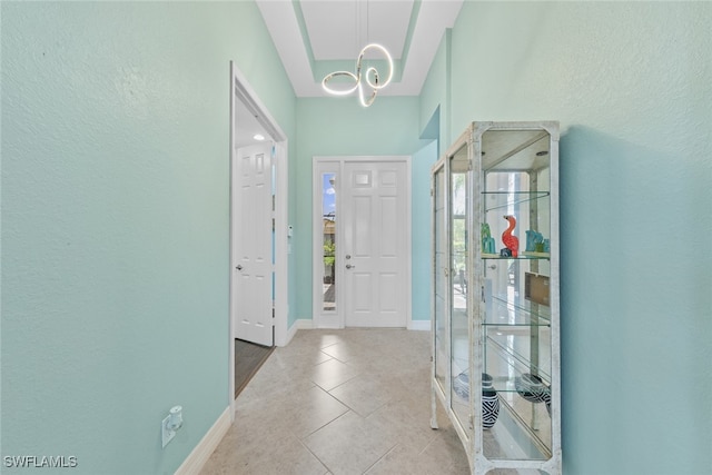 entryway with light tile patterned floors