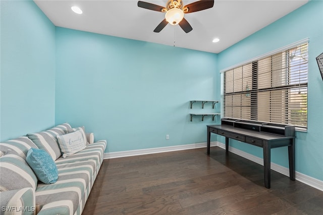 office featuring dark hardwood / wood-style floors and ceiling fan