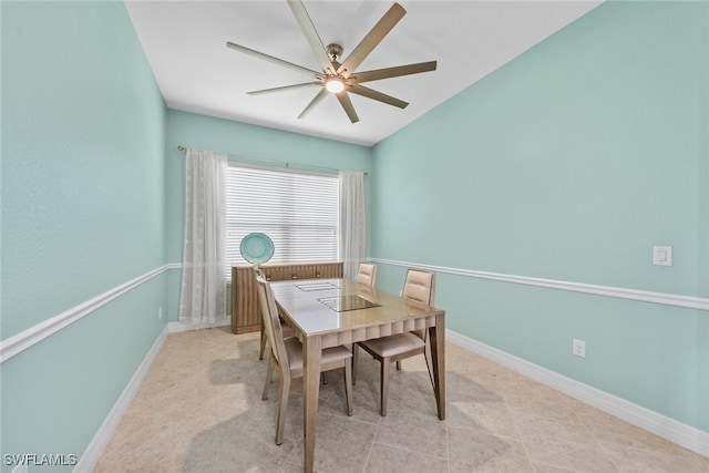 dining room featuring ceiling fan