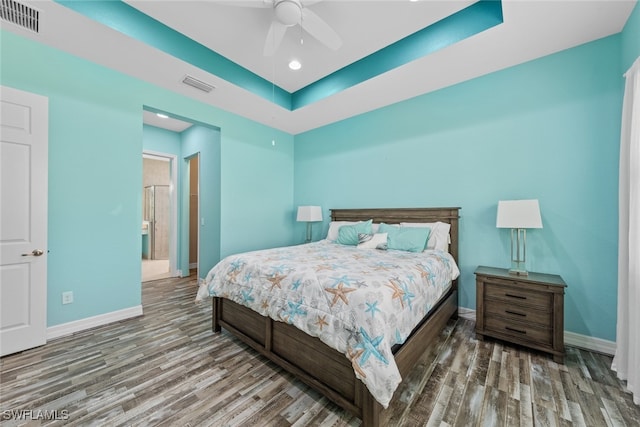 bedroom with dark wood-type flooring and ceiling fan