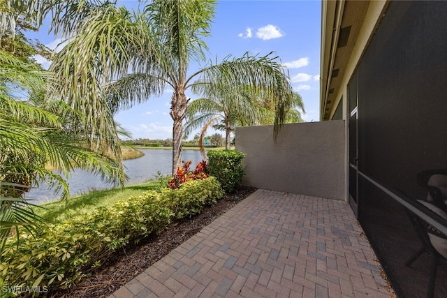 view of patio / terrace featuring a water view