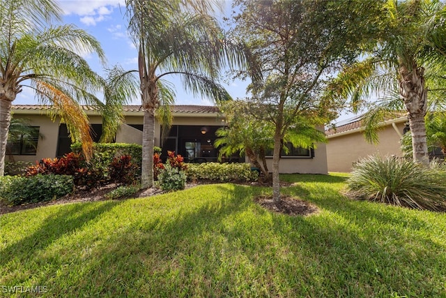 view of front of property with a front lawn