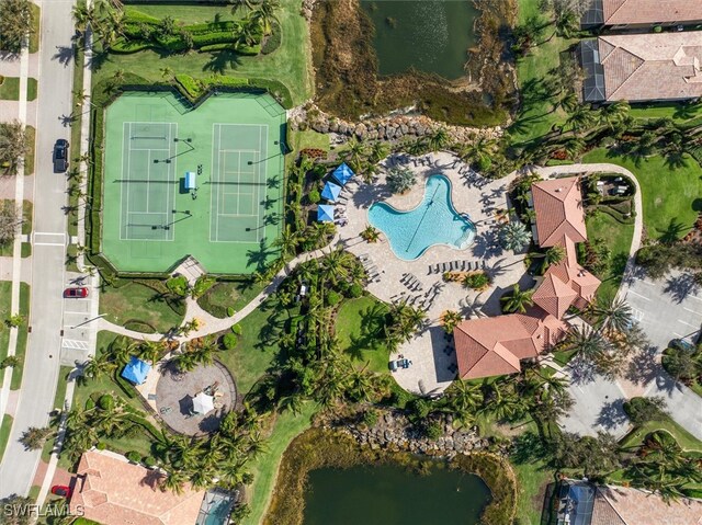 birds eye view of property featuring a water view