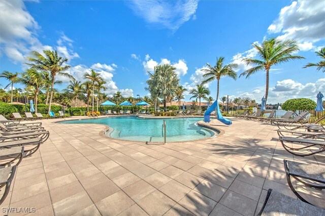 view of pool featuring a patio