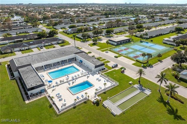 birds eye view of property with a residential view