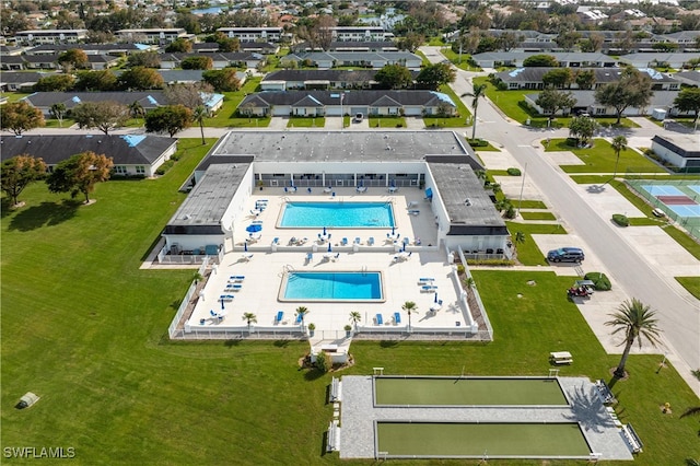 birds eye view of property with a residential view