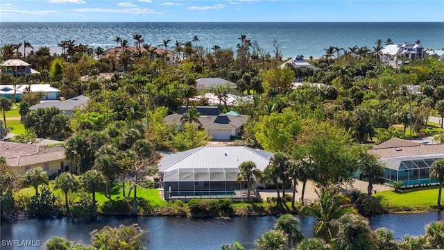 drone / aerial view with a water view