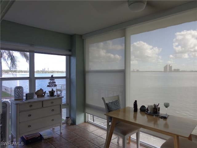 dining room with a water view