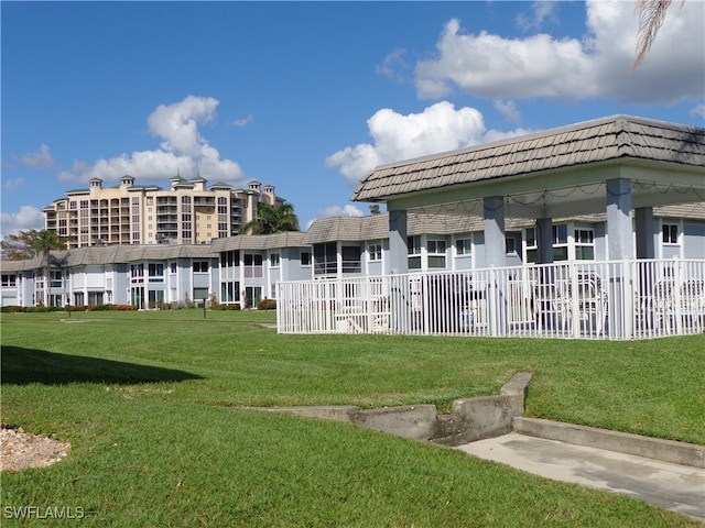 view of home's community featuring a yard