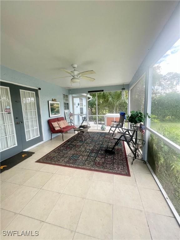 3871 27th Ave SW, Naples, FL 34117 - sunroom / solarium featuring an outdoor living space, ceiling fan, and french doors