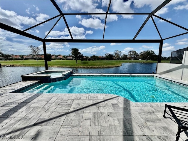 view of pool featuring a water view, a patio area, a pool with connected hot tub, and glass enclosure