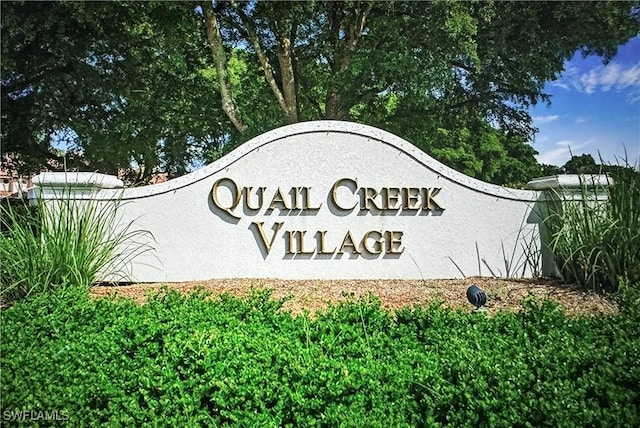 view of community sign