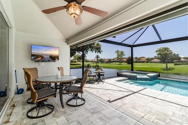 view of patio / terrace with a pool with hot tub, glass enclosure, and ceiling fan