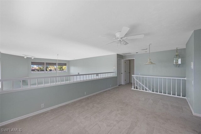 bedroom with ceiling fan and carpet