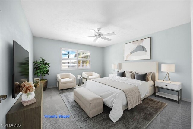 carpeted bedroom with ceiling fan