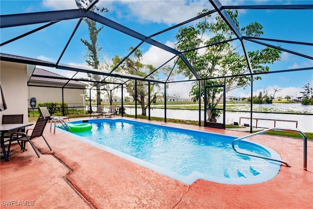 view of swimming pool featuring a patio area, a water view, and a lanai