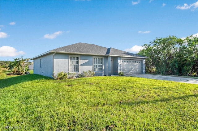 ranch-style house featuring a front yard and a garage