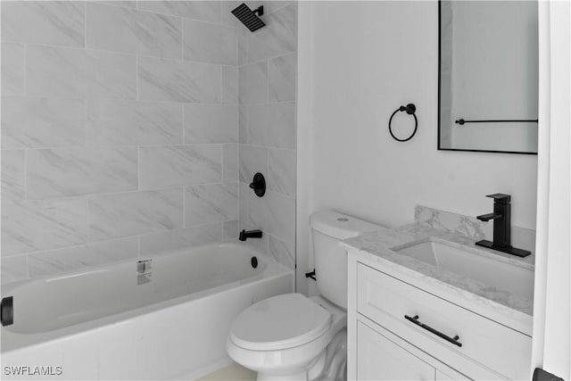 full bathroom with tiled shower / bath combo, vanity, and toilet