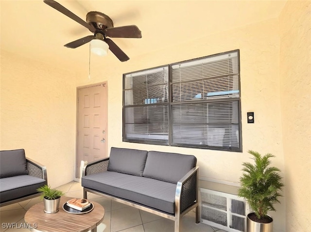 view of patio featuring an outdoor hangout area and ceiling fan