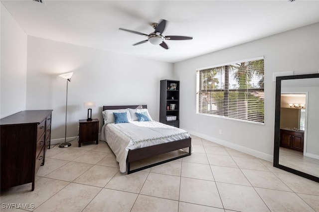 bedroom with light tile patterned floors and ceiling fan