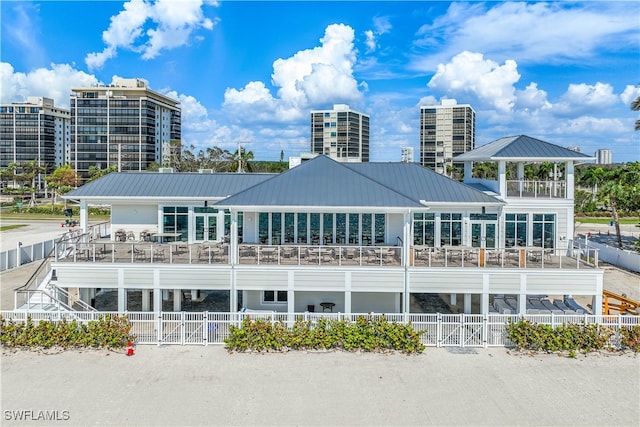 back of house with a balcony