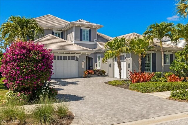 view of front of property with a garage