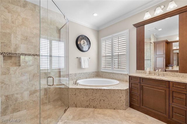 bathroom with vanity, crown molding, and independent shower and bath