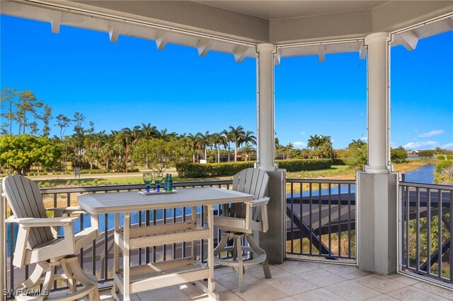 view of patio / terrace with a water view