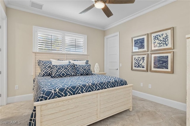 bedroom with ceiling fan, crown molding, and carpet