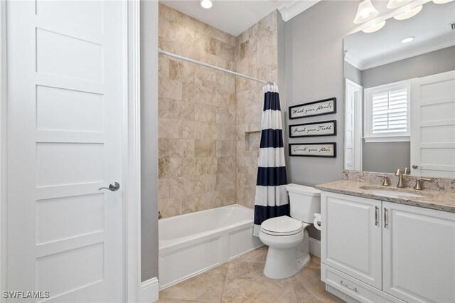 full bathroom featuring vanity, toilet, and shower / tub combo with curtain