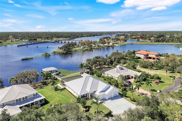 drone / aerial view with a water view