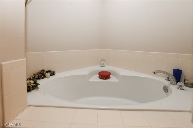 bathroom featuring tiled bath