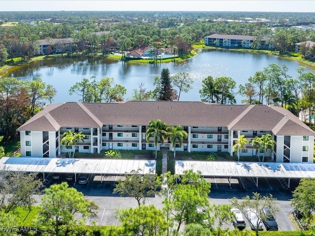 drone / aerial view with a water view