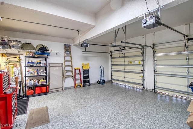 garage featuring a garage door opener