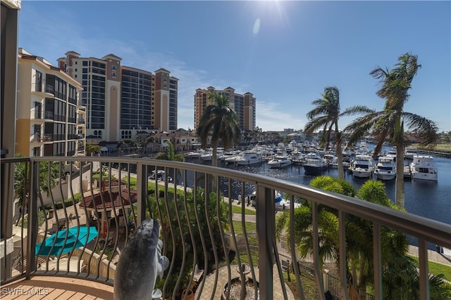 balcony featuring a water view