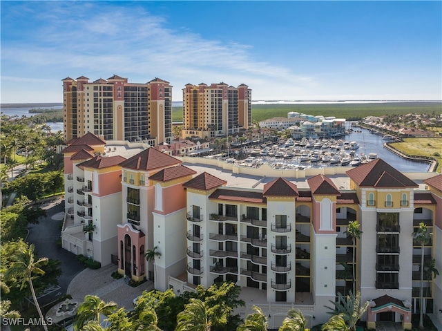 birds eye view of property featuring a water view