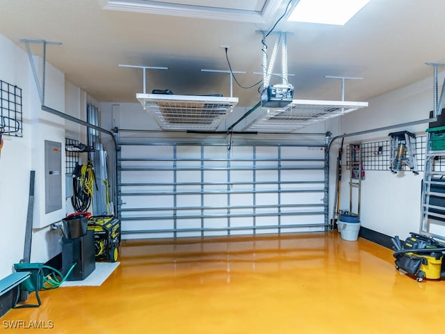 garage featuring a garage door opener and electric panel