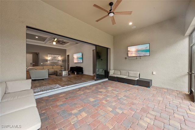 view of patio / terrace with ceiling fan and an outdoor hangout area